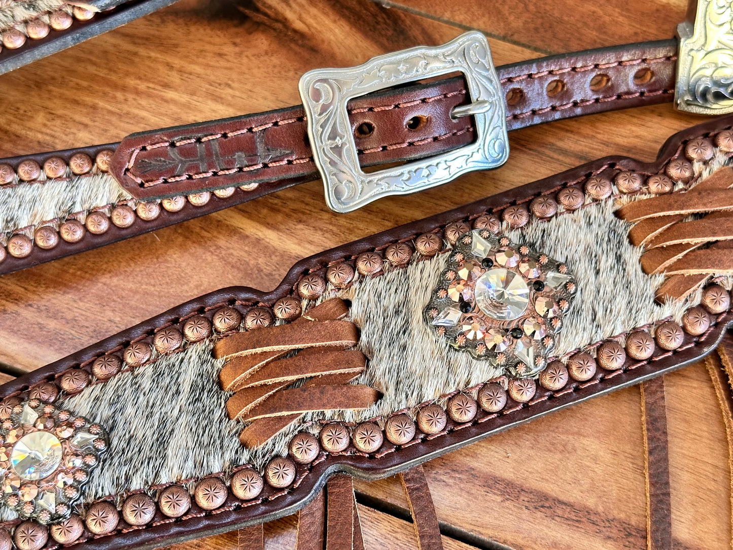 COWHIDE WITH CROSS STITCH