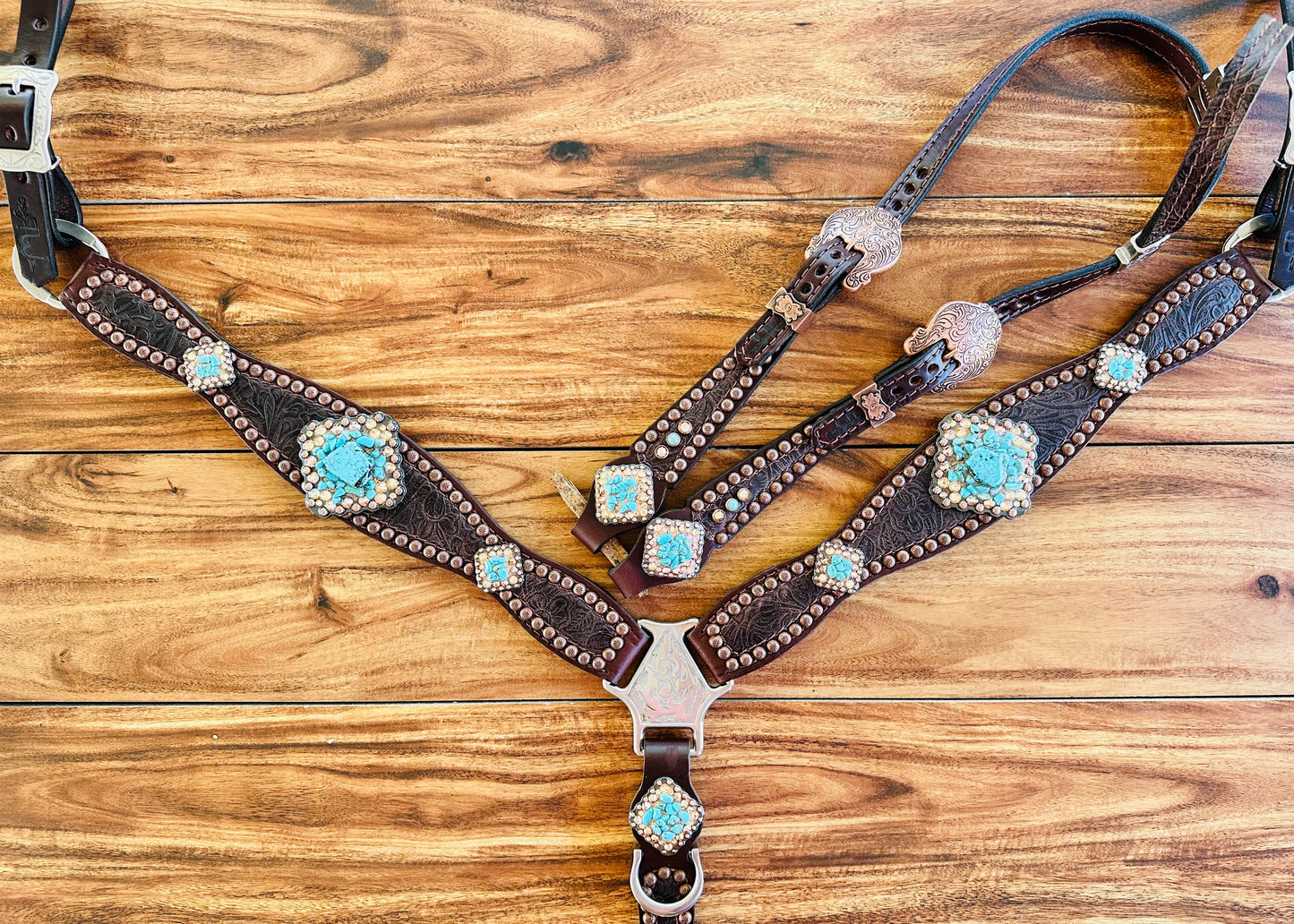 Brown tooled with turquoise rocks