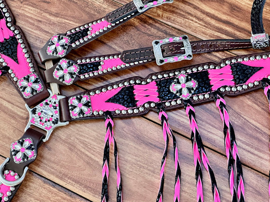Black cheetah with bright pink cross stitch with twisted fringe