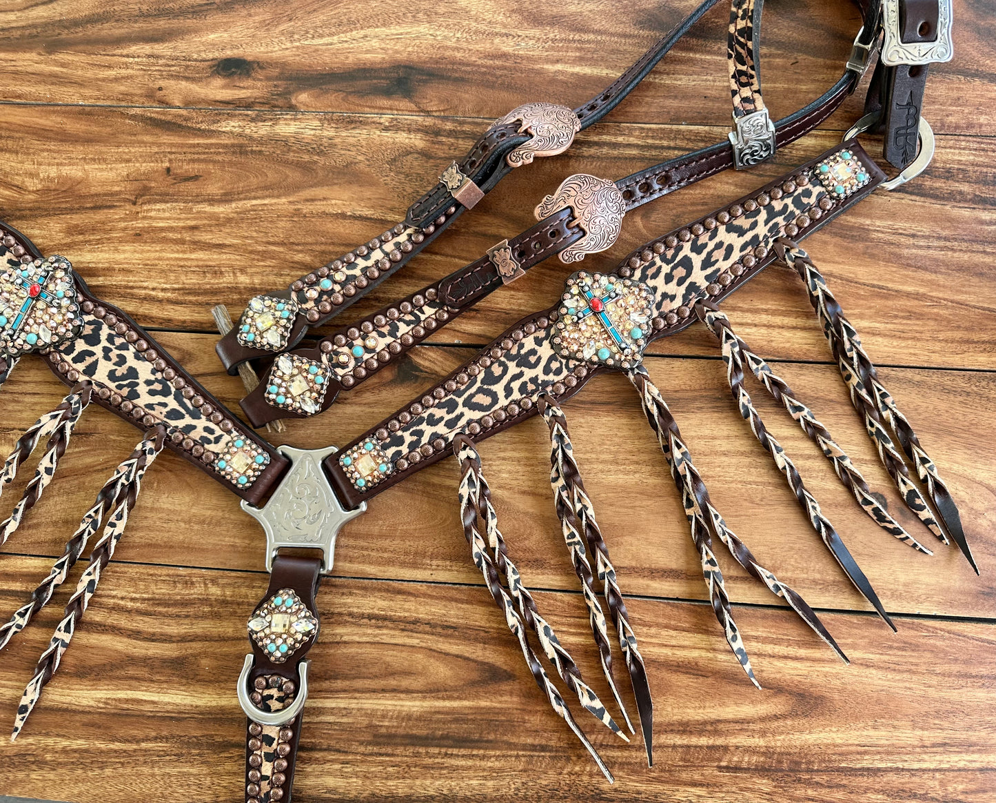 Tawny cheetah with fringe and cross conchos