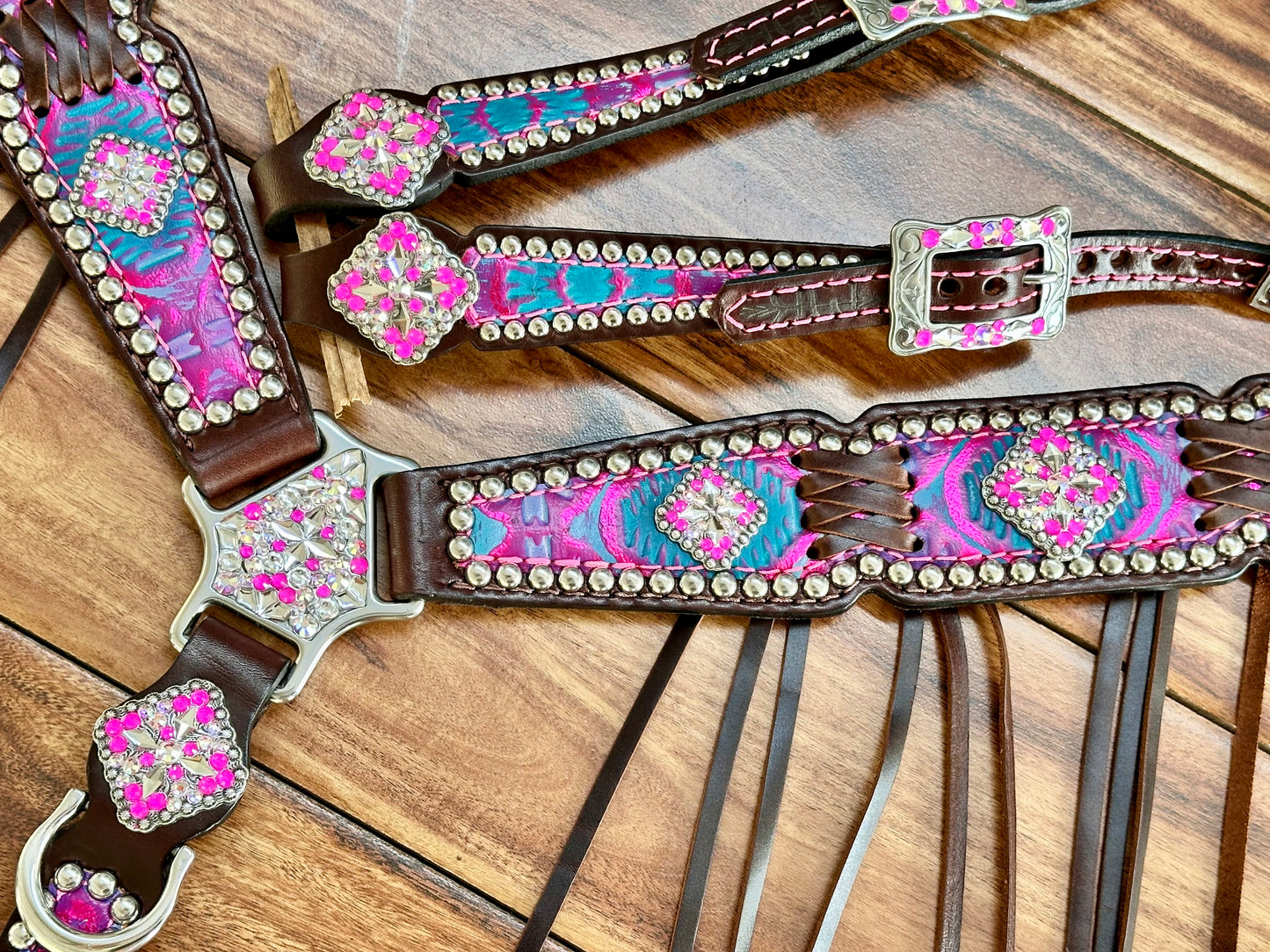 Pink and turquoise Aztec with cross stitch