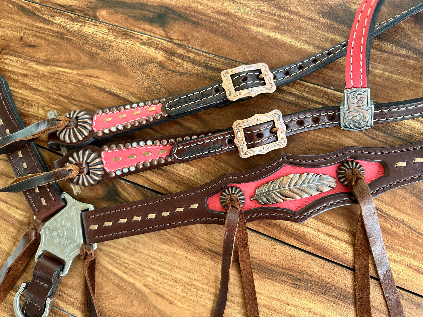 Coral with feather & pinwheel conchos