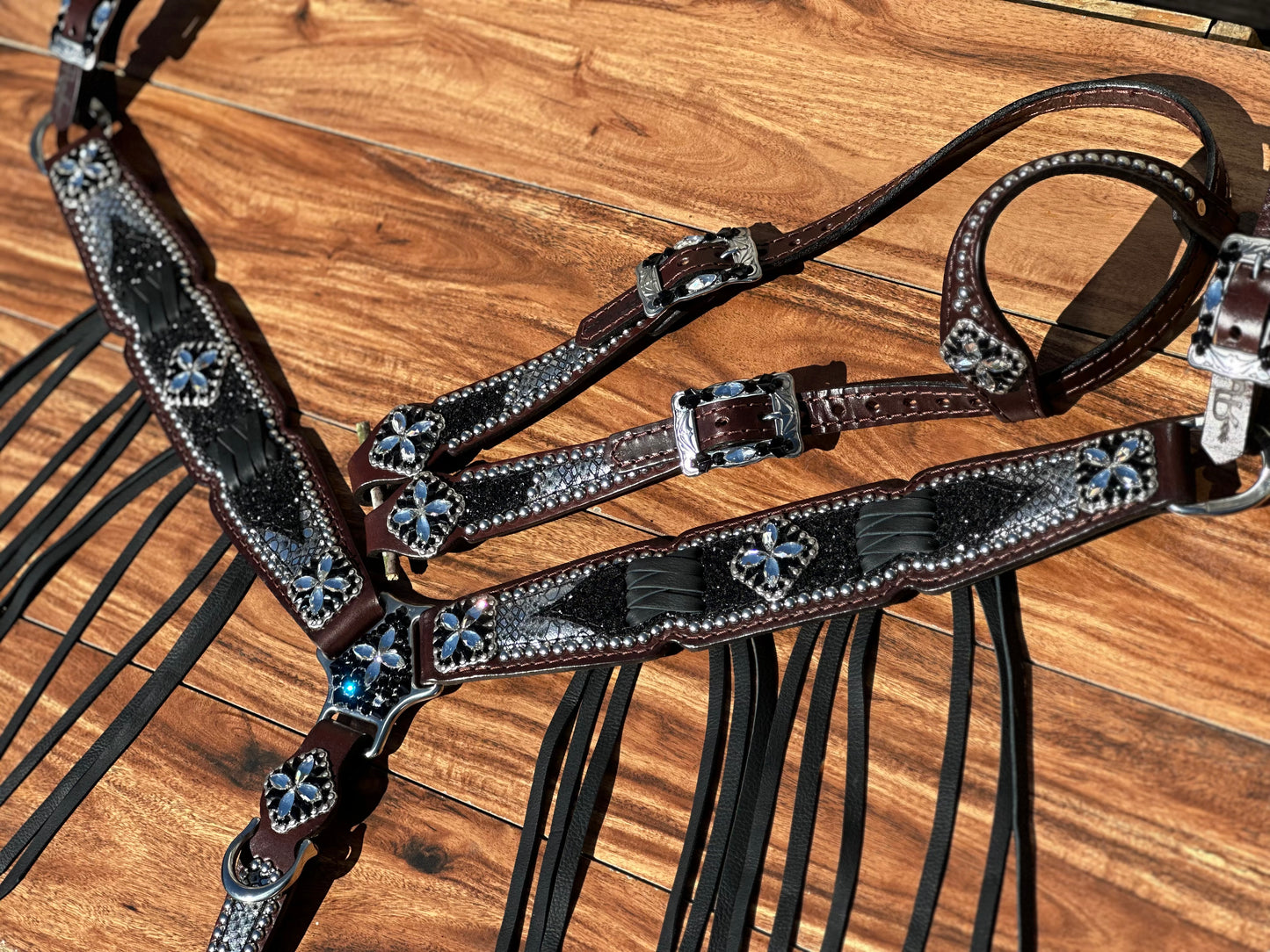 Silver Mystic with black chunky glitter. Cross stitch and fringe.