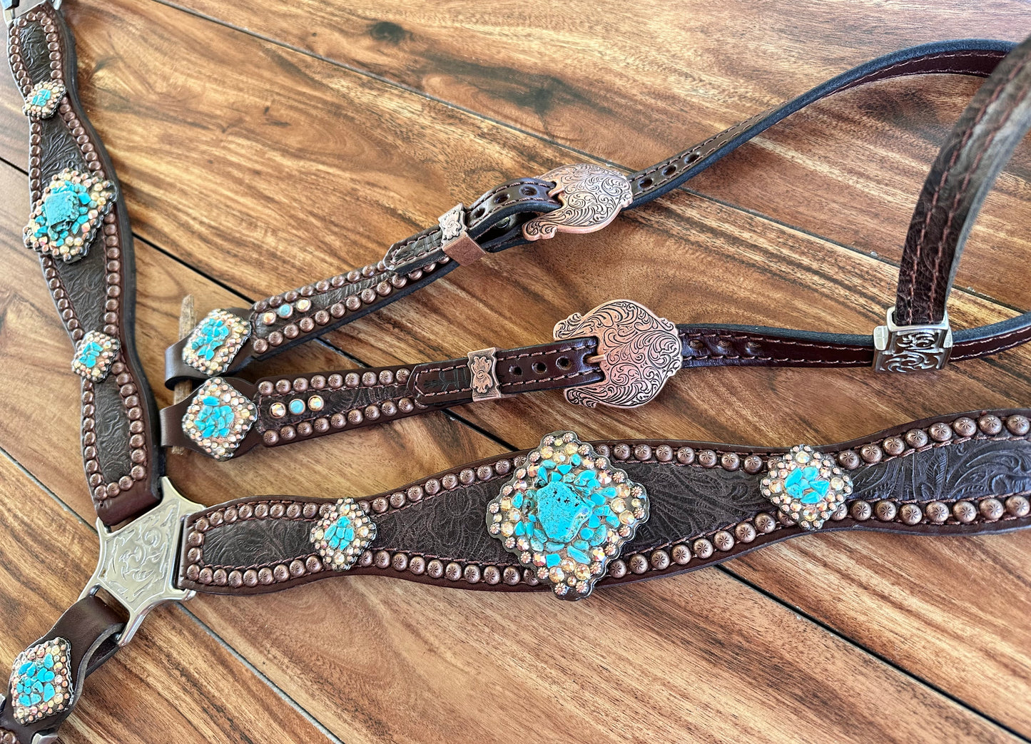 Brown tooled with turquoise rocks