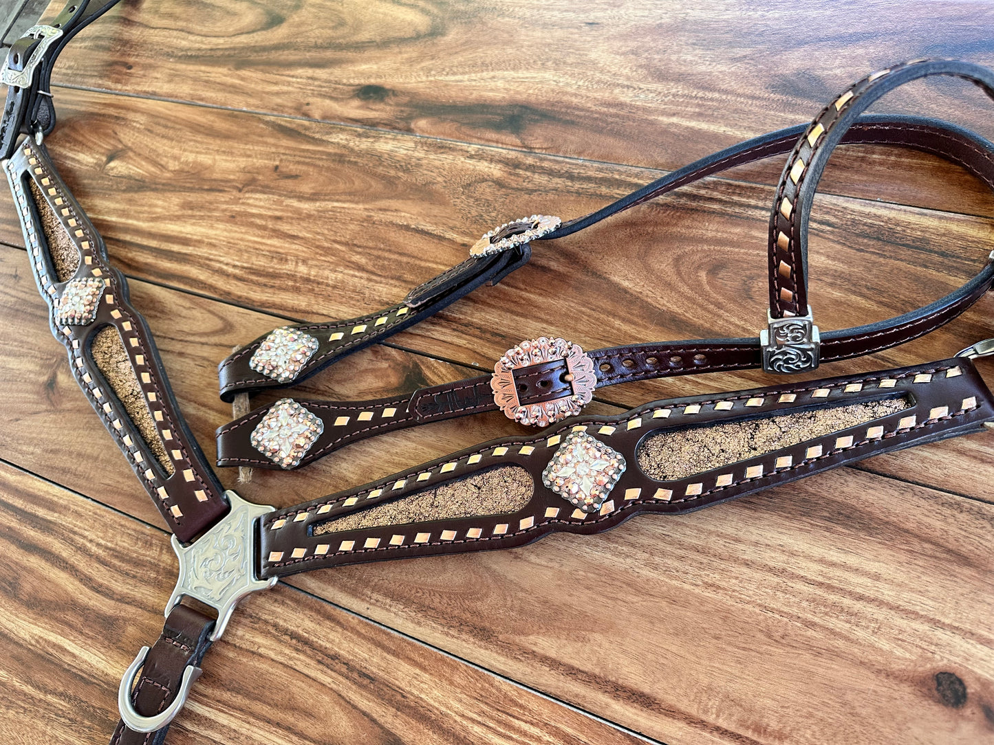 Rose gold inlay with rose gold buckstitch