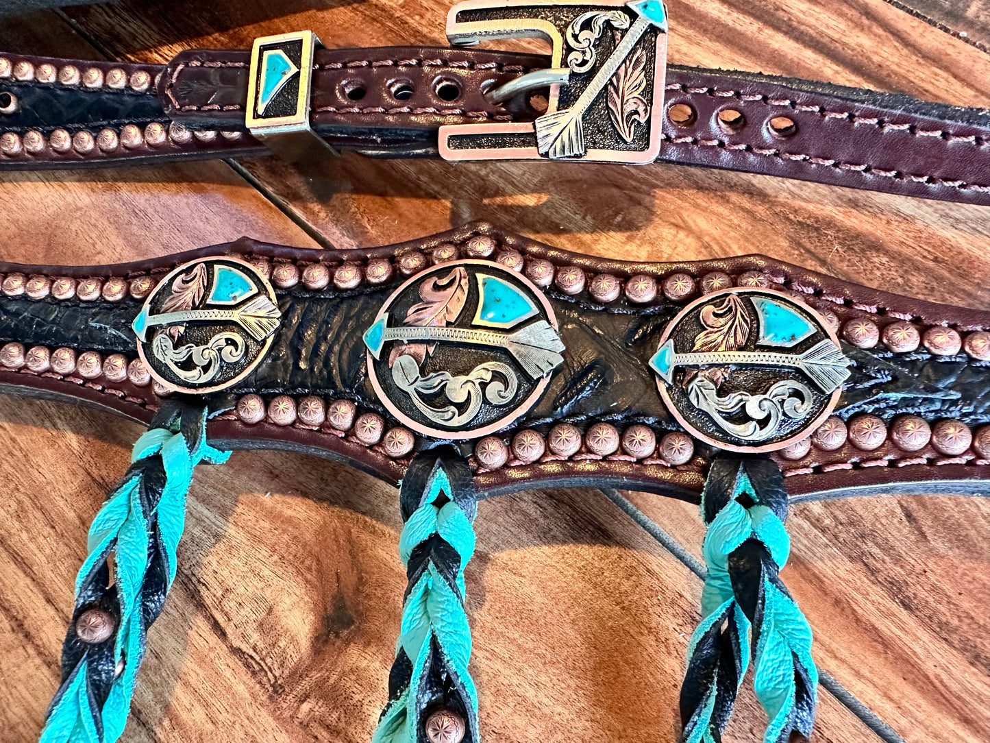 Black elephant with arrows and fringe