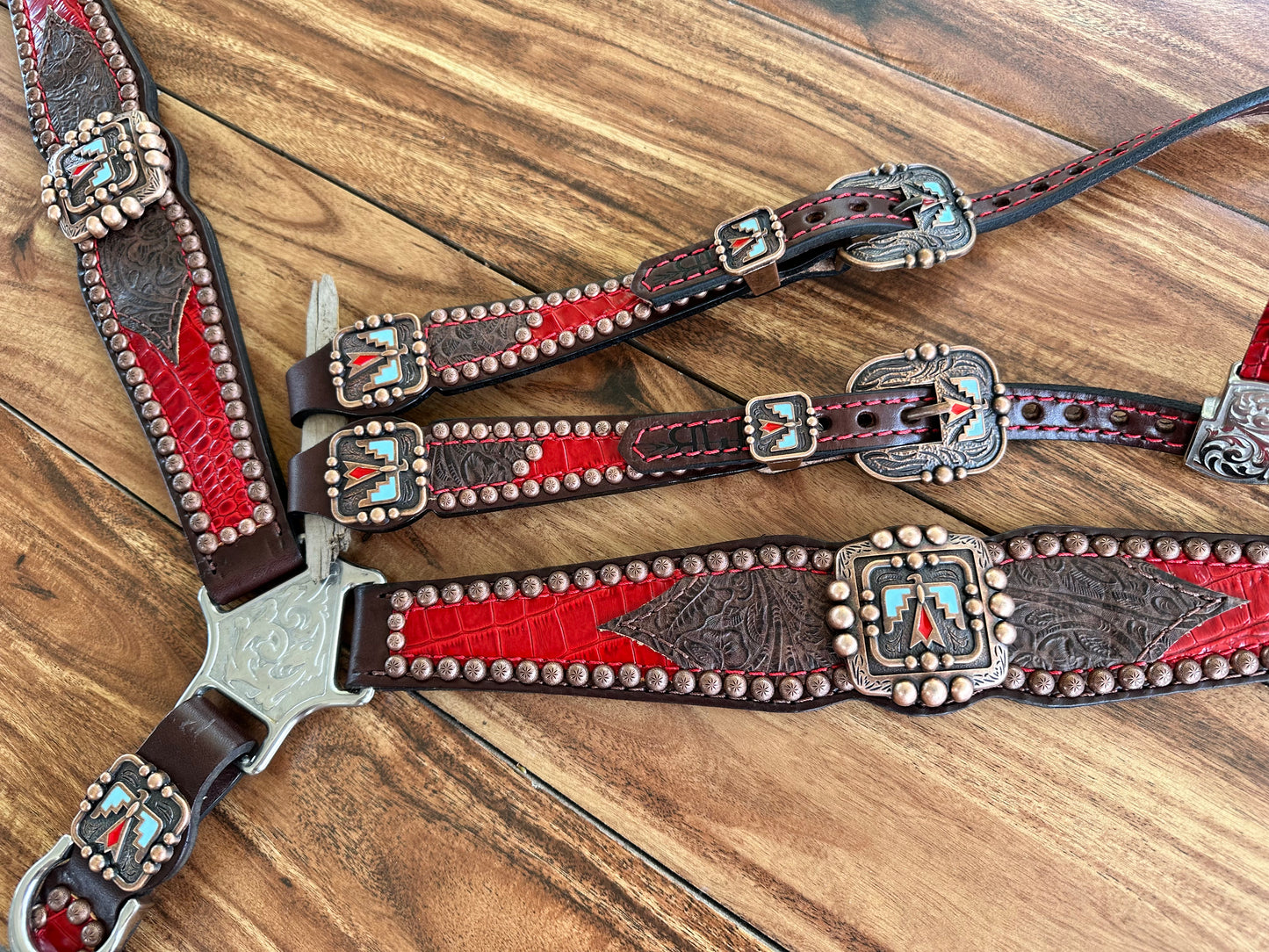 Red gator and brown tooled with thunderbirds