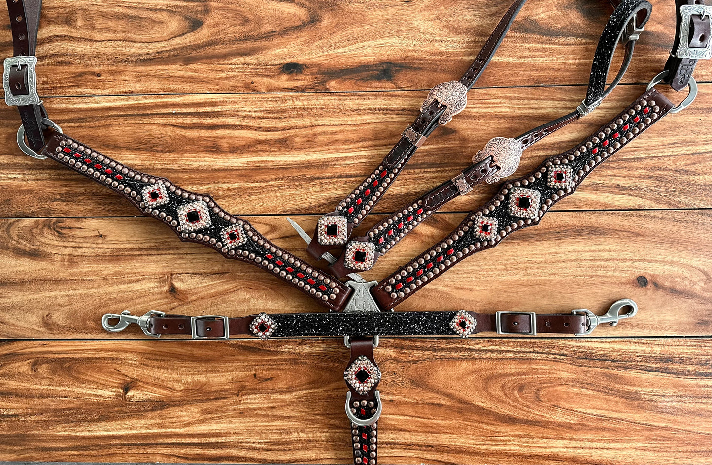 Chunky black glitter w/ metallic red buckstitch
