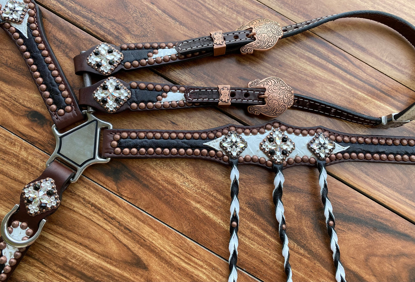Black elephant and white gator with tassels