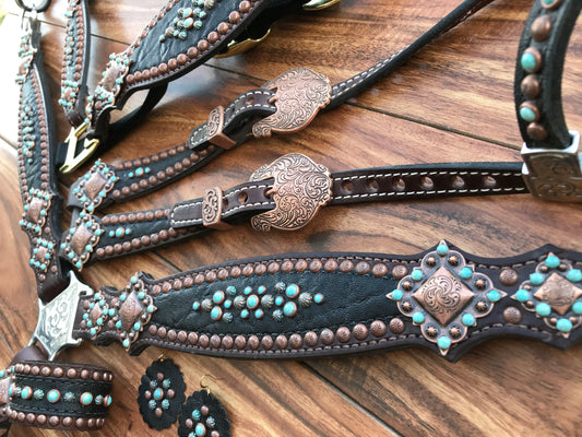 Black elephant with turquoise rocks