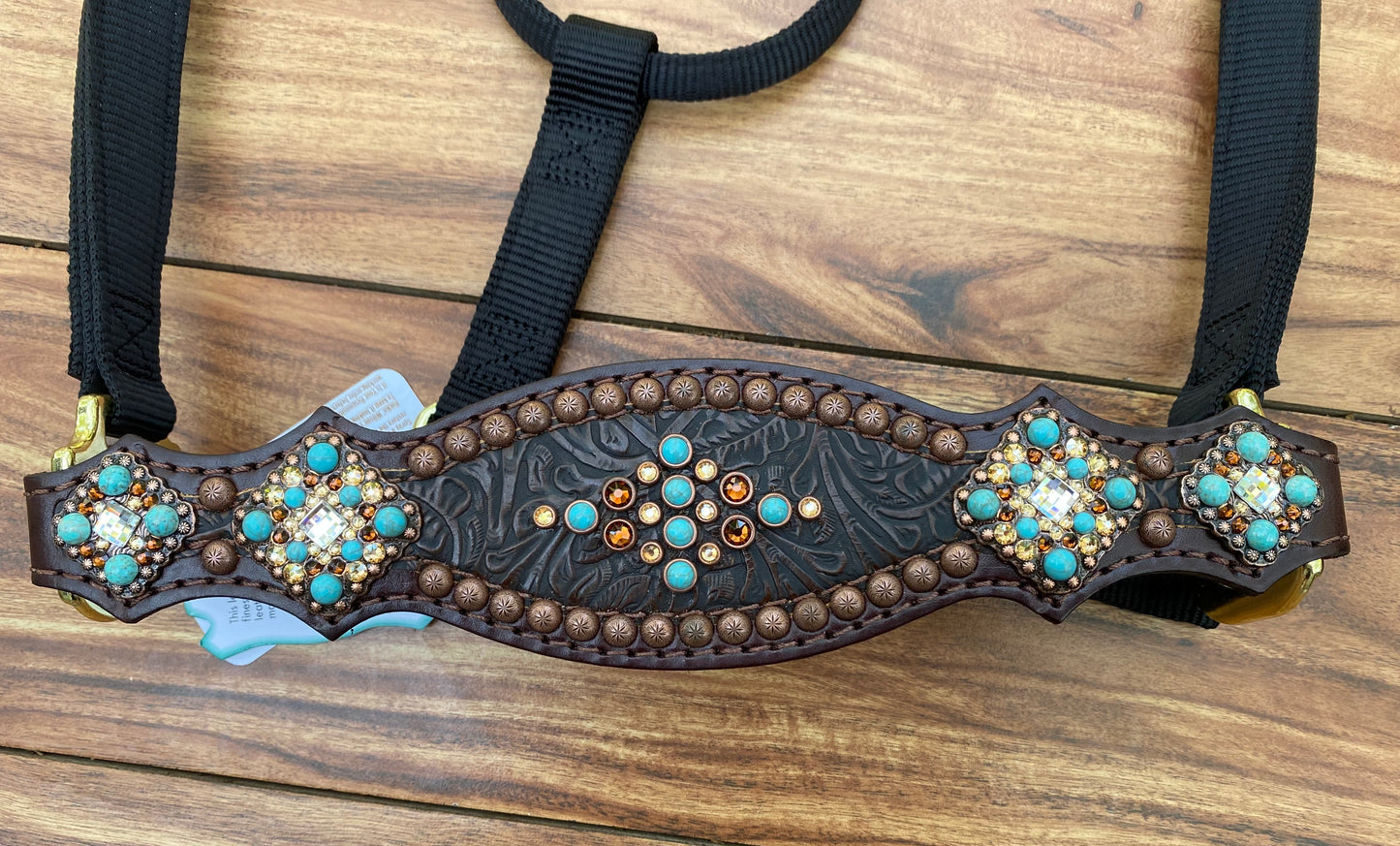 Brown tooled with turquoise and smoked topaz
