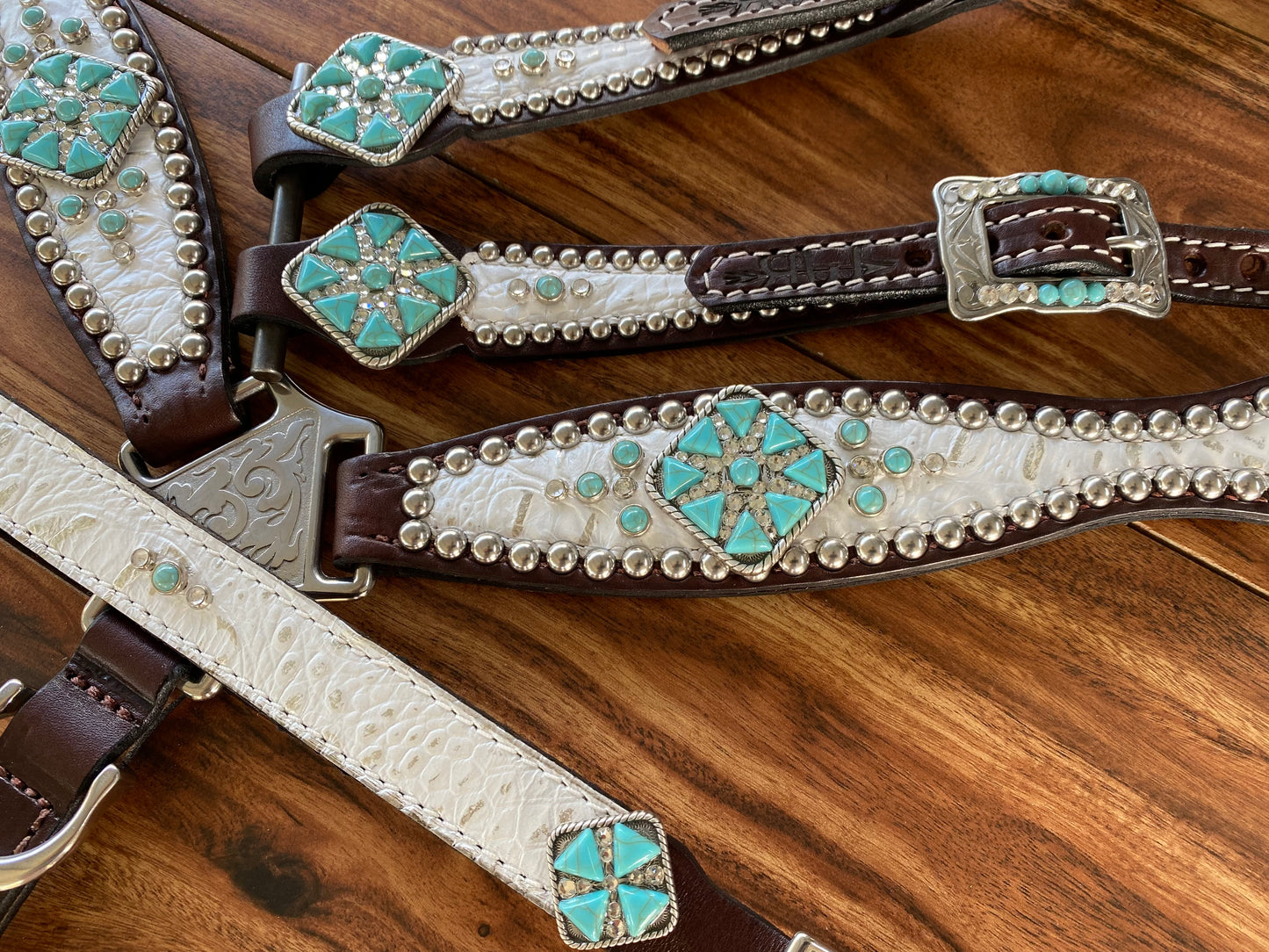 White gator with turquoise triangles