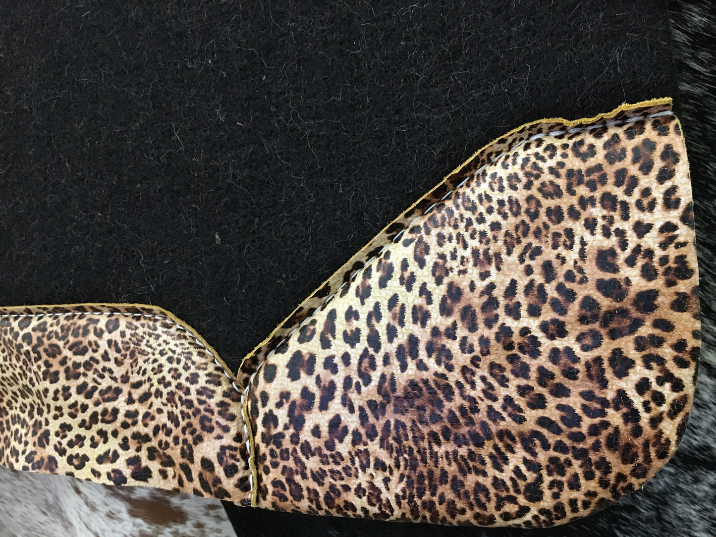 Best ever saddle pad with cheetah wear leathers