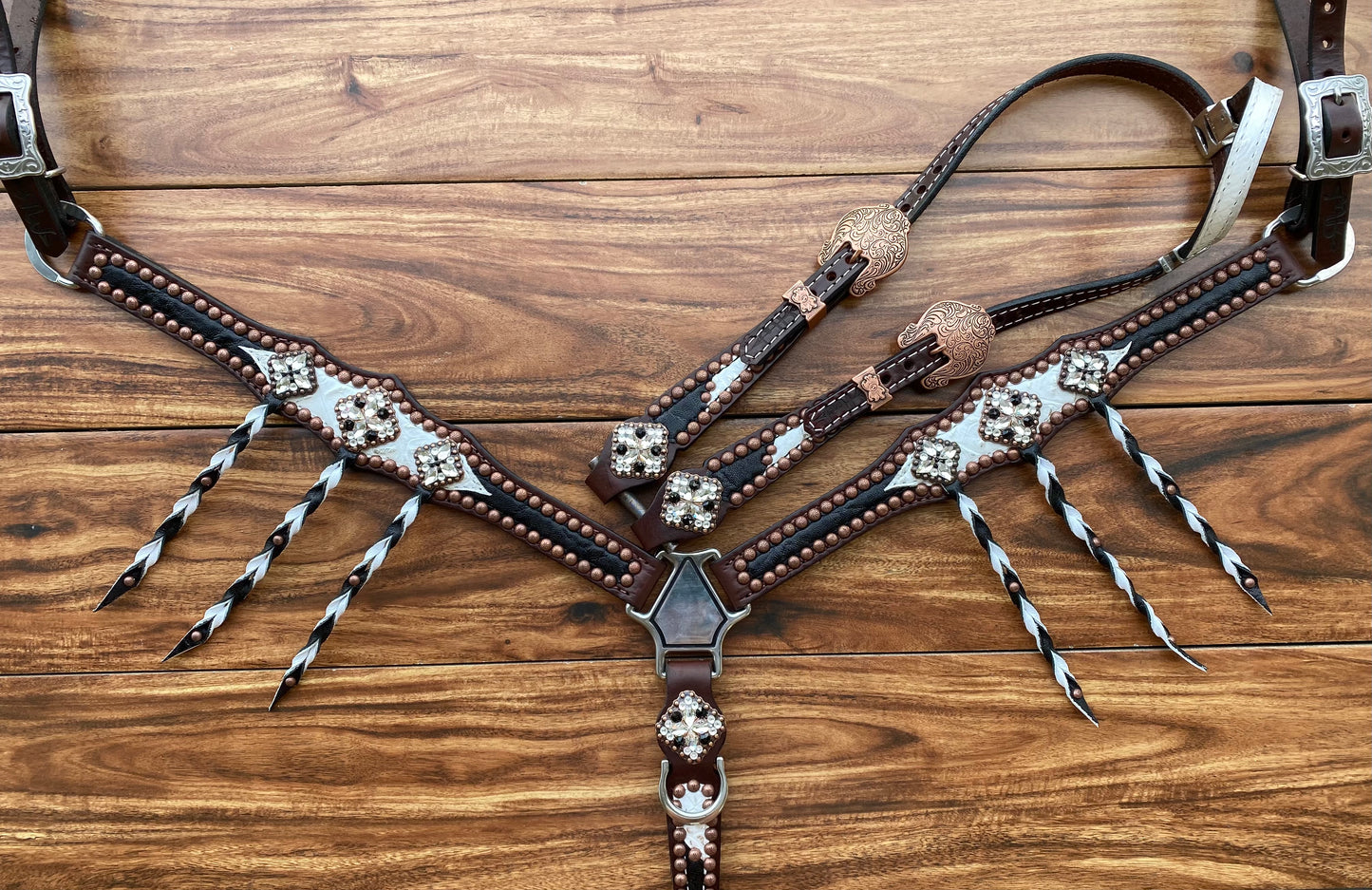 Black elephant and white gator with tassels