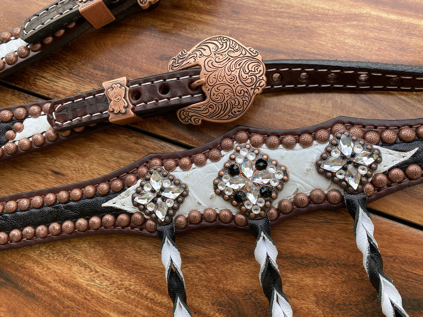 Black elephant and white gator with tassels