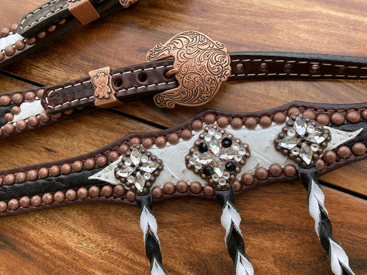 Black elephant and white gator with tassels