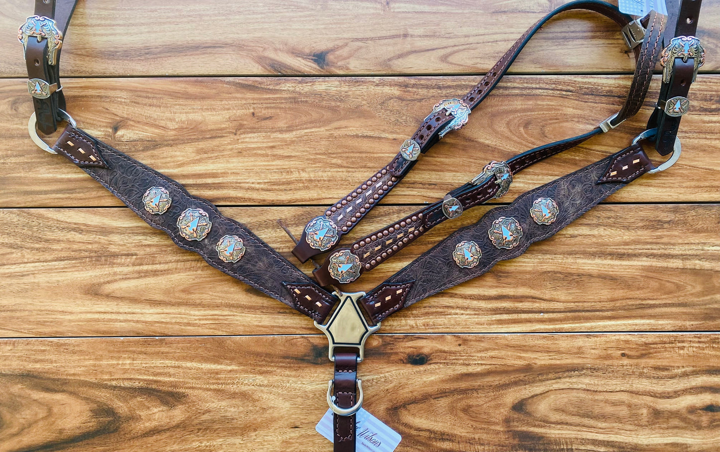 Brown tooled with arrow conchos