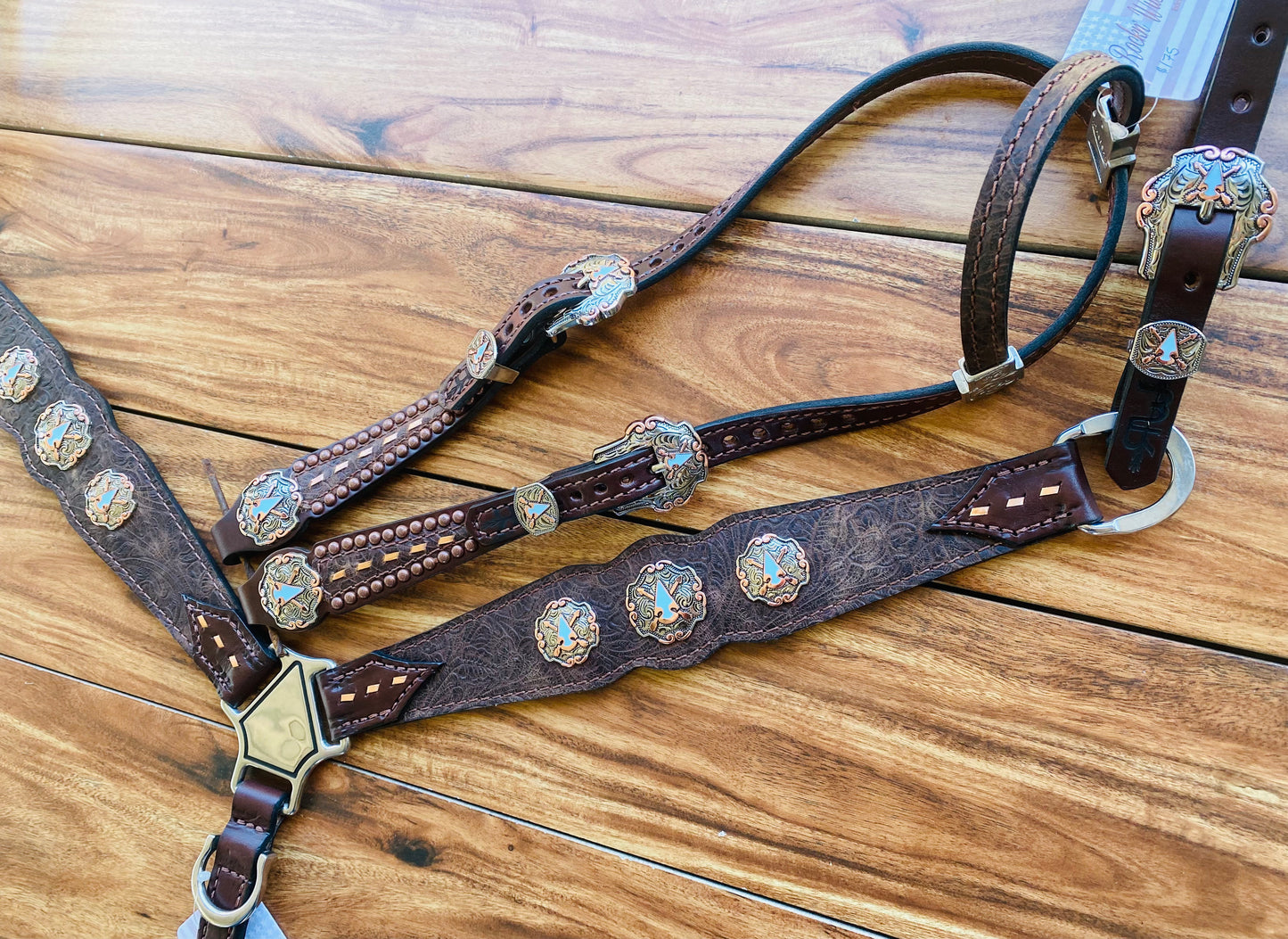 Brown tooled with arrow conchos