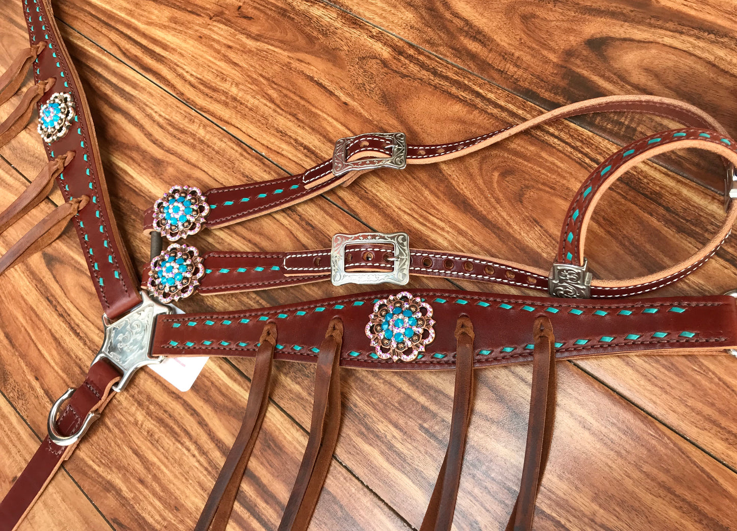 Turquoise buckstitch and round conchos