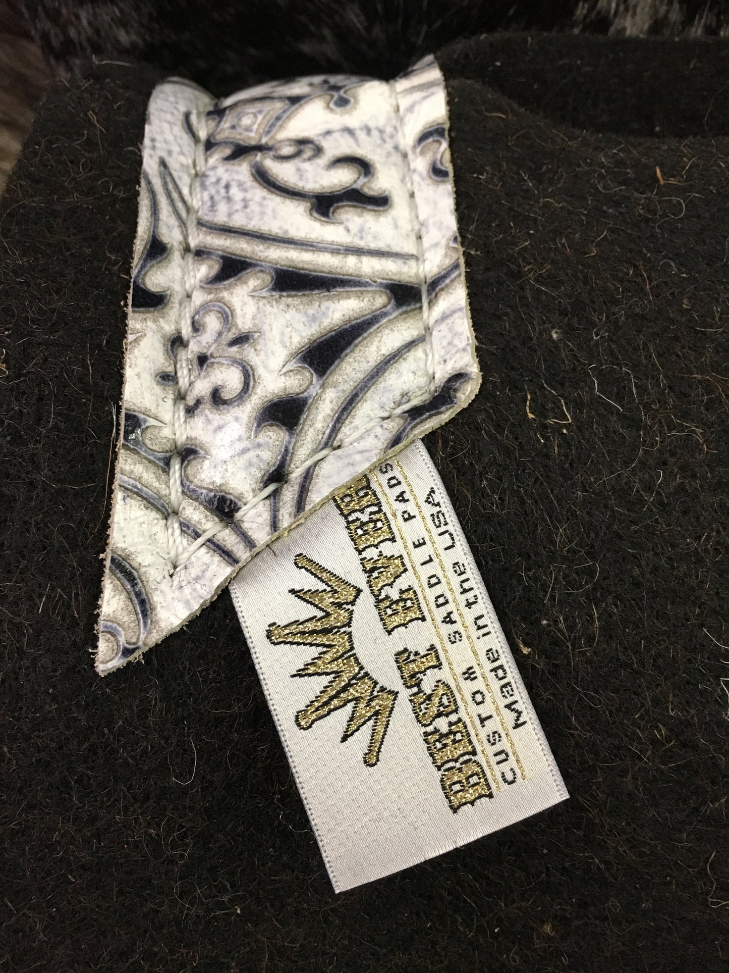 Best ever pad with white fleur de lis wear leathers