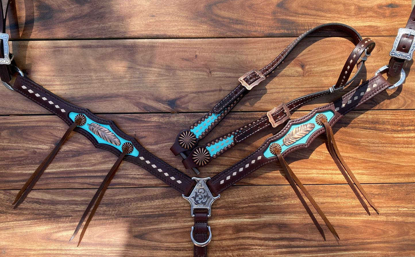 Turquoise with feather and pinwheel conchos