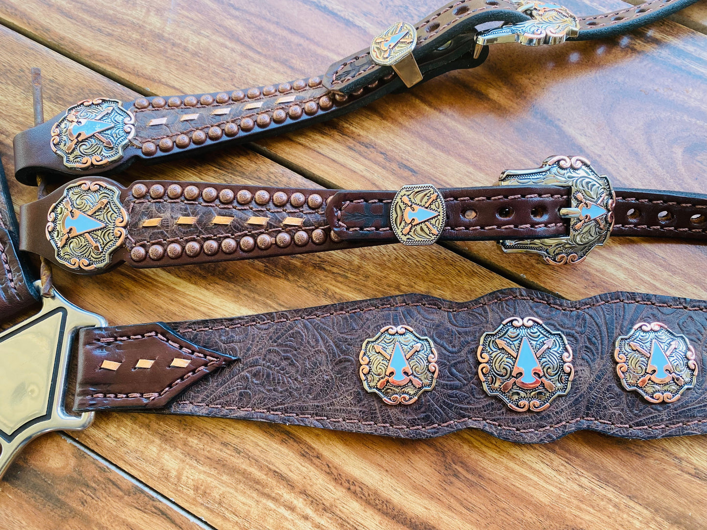 Brown tooled with arrow conchos