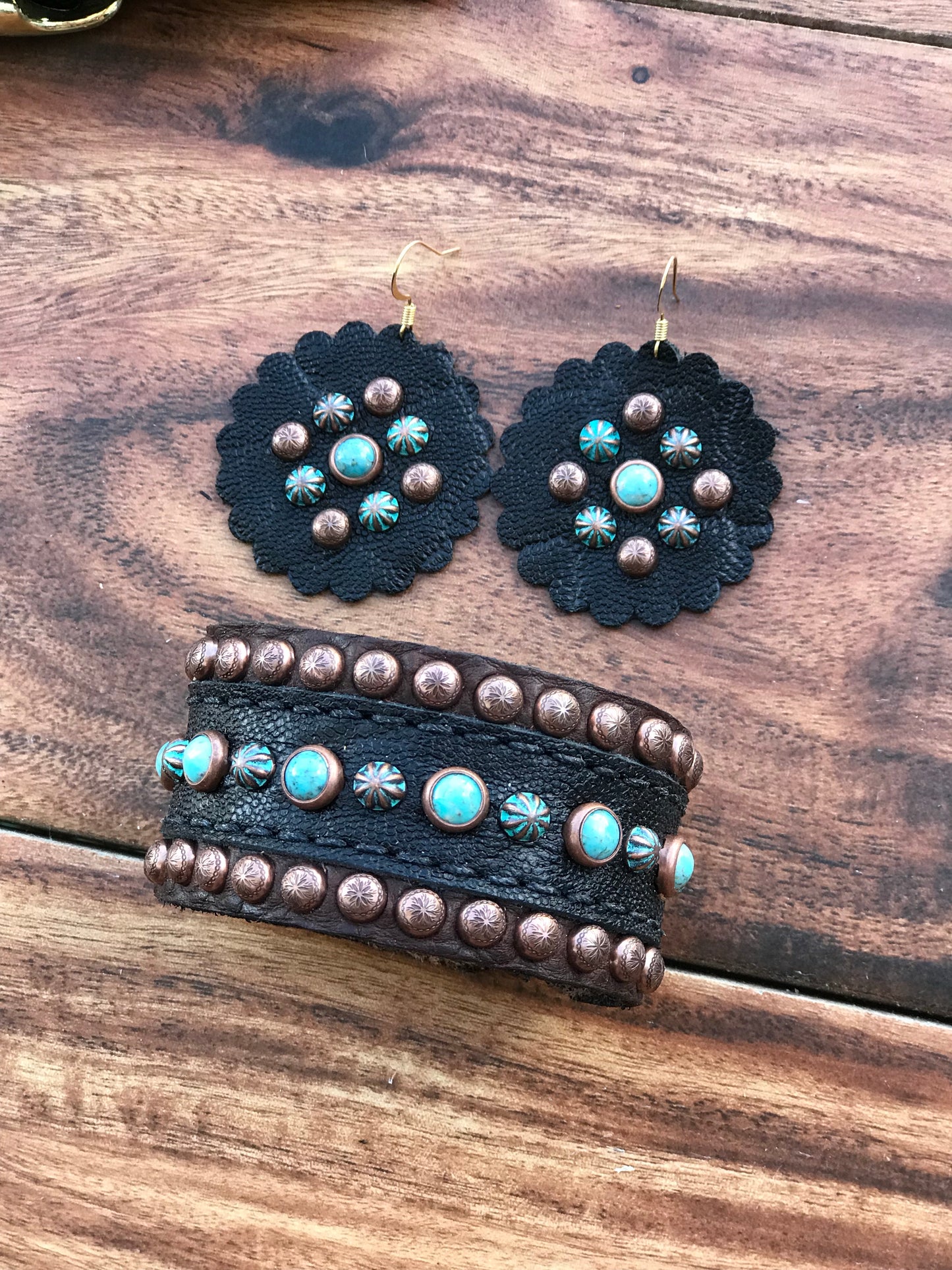 Black elephant with turquoise rocks