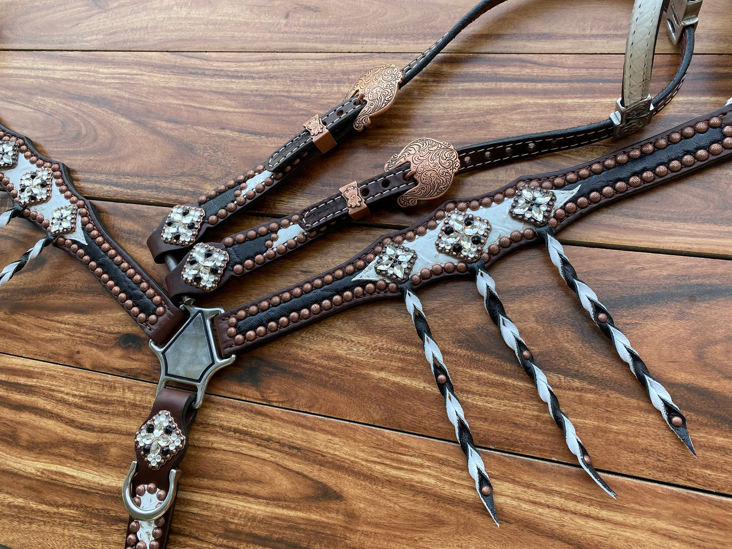 Black elephant and white gator with tassels