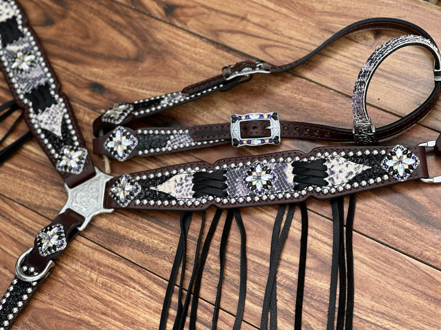 Python with black chunky glitter. Cross stitch and fringe.