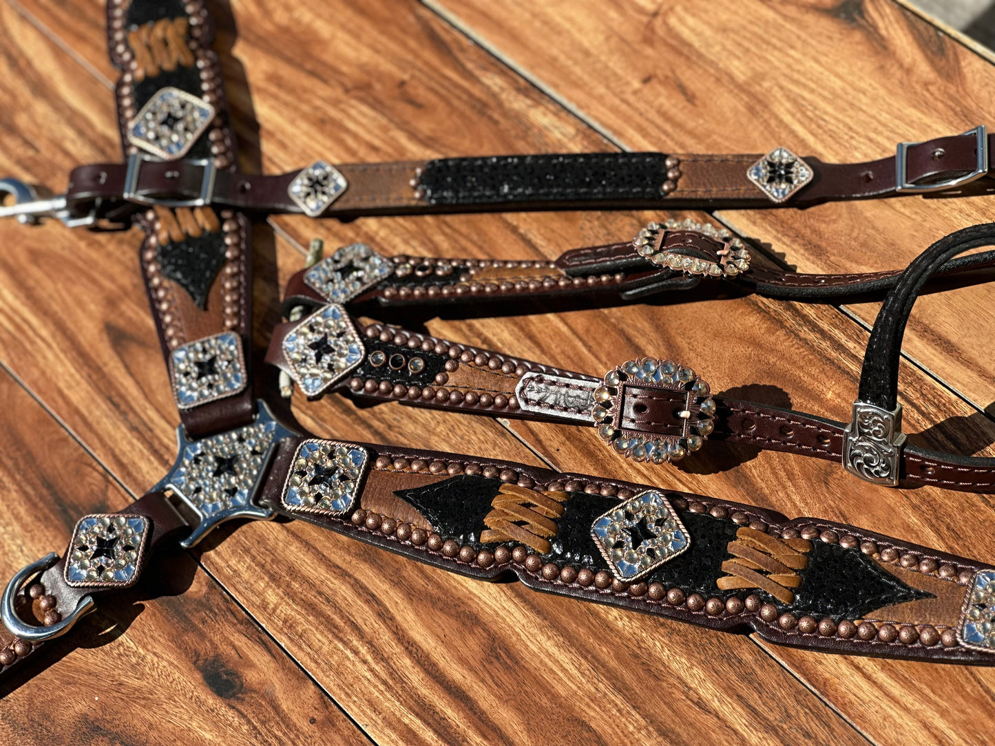 Black cheetah over brown with cross stitch. With or without fringe.