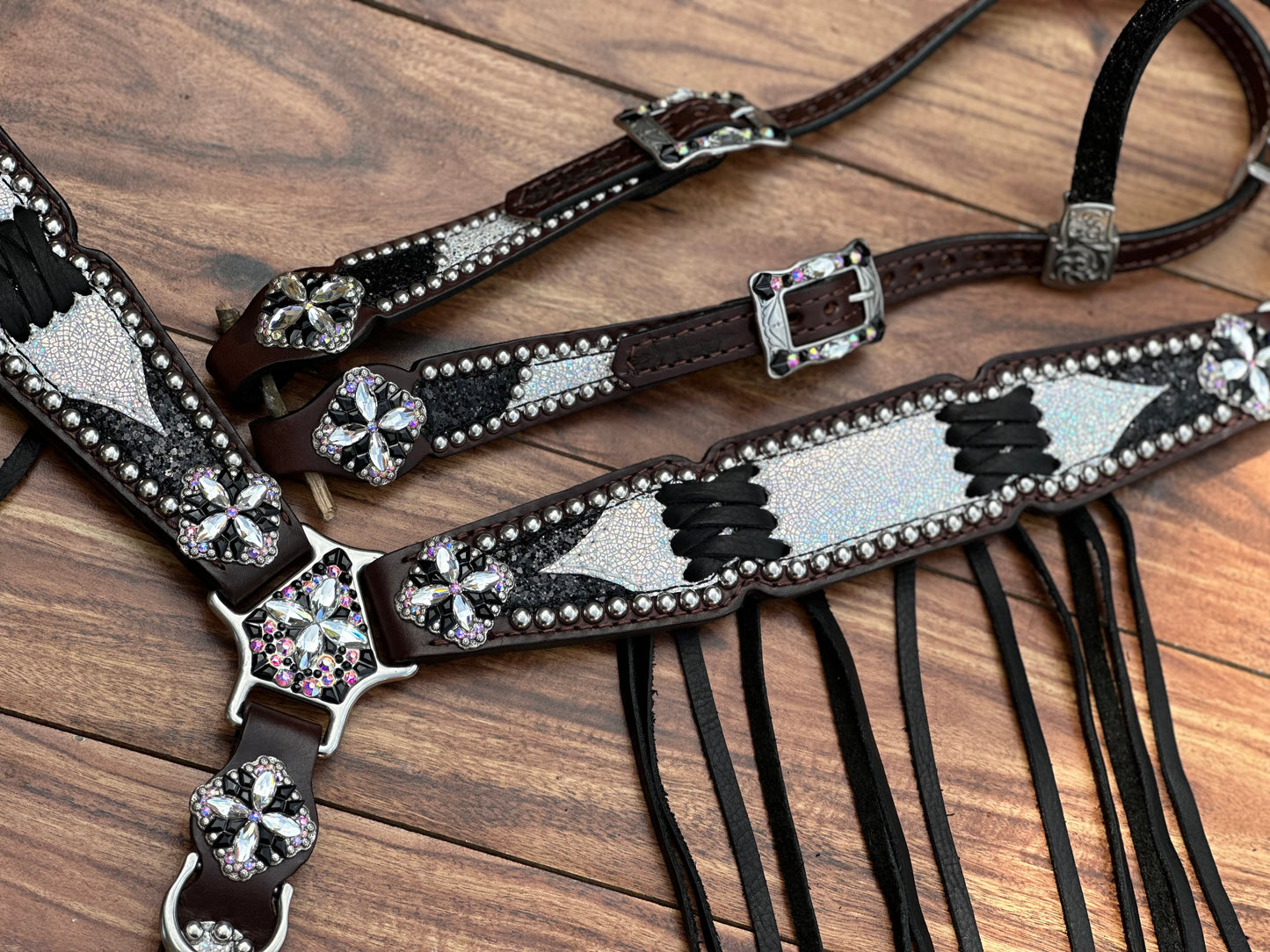 Ice over black chunky glitter. Cross stitch and fringe.