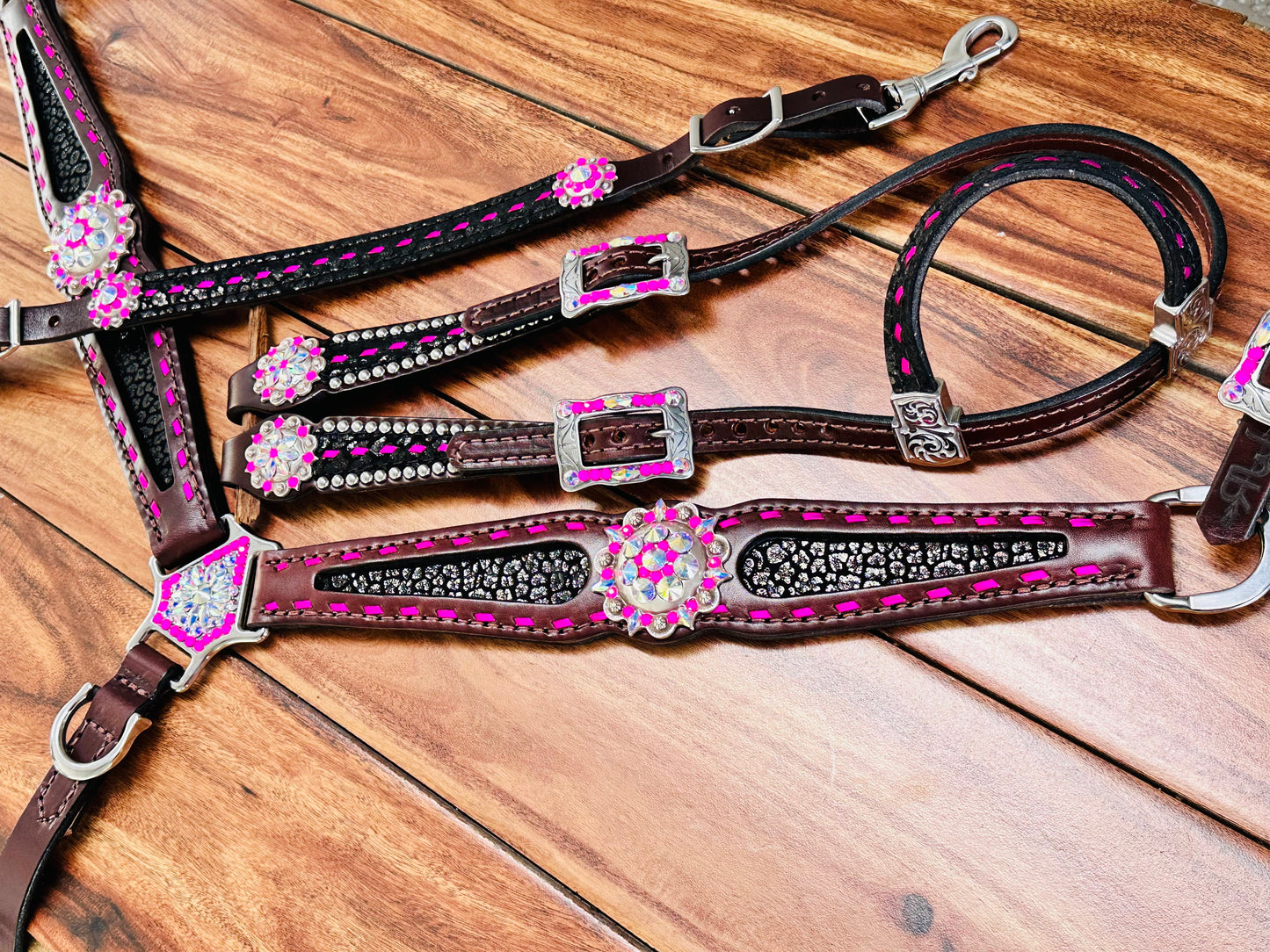 Black cheetah with bright pink buckstitch