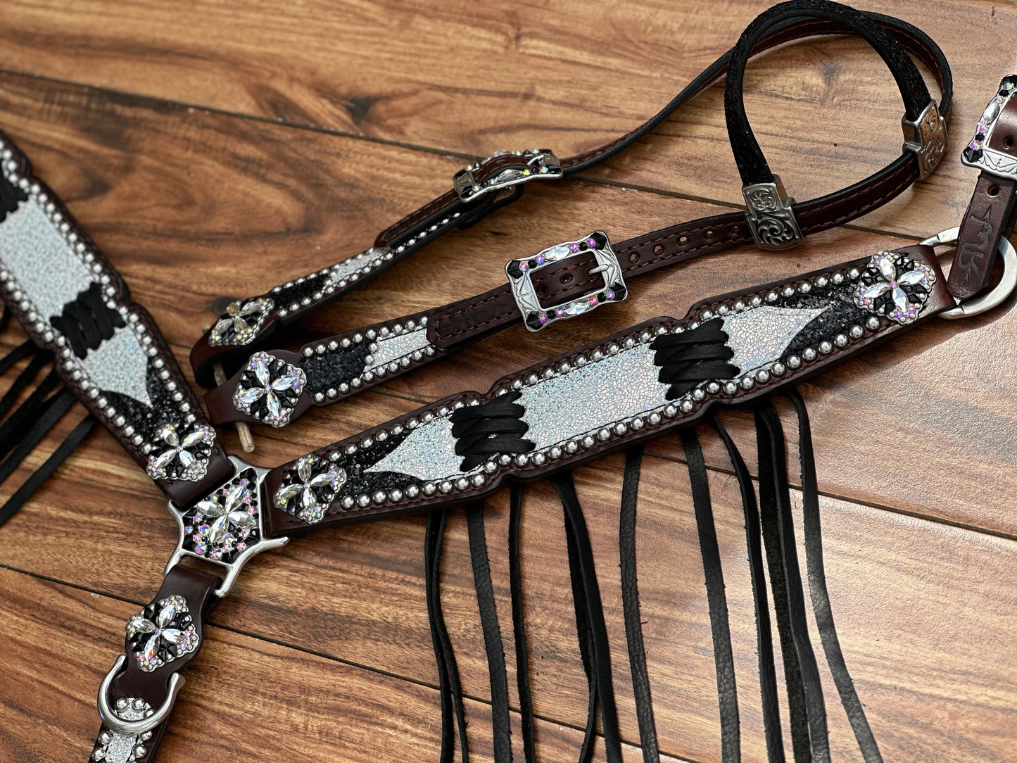 Ice over black chunky glitter. Cross stitch and fringe.