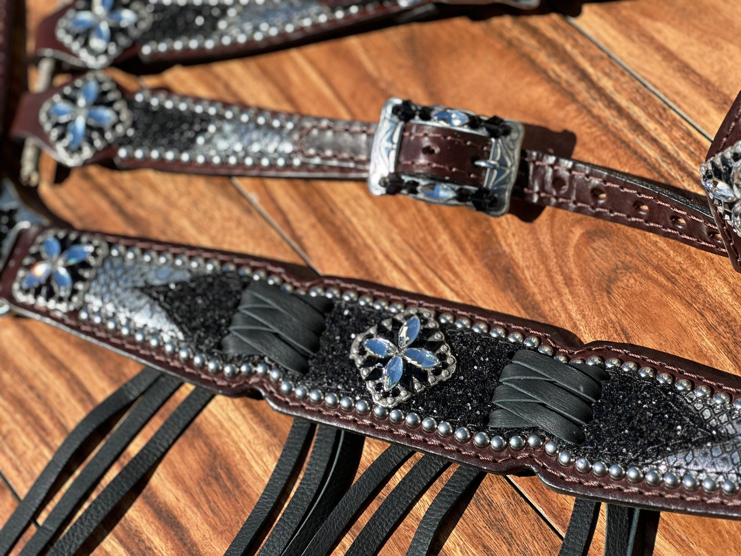 Silver Mystic with black chunky glitter. Cross stitch and fringe.