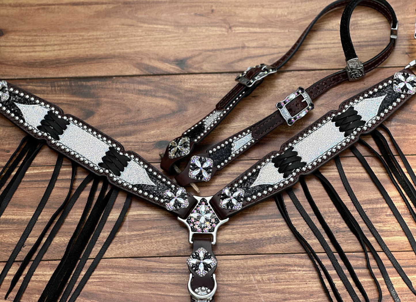 Ice over black chunky glitter. Cross stitch and fringe.