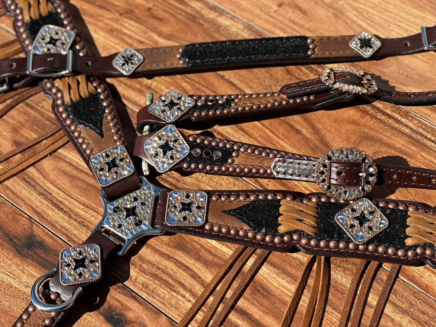 Black cheetah over brown with cross stitch. With or without fringe.