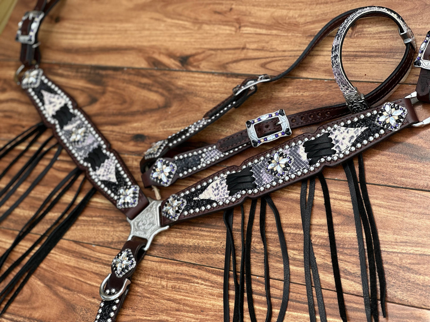 Python with black chunky glitter. Cross stitch and fringe.