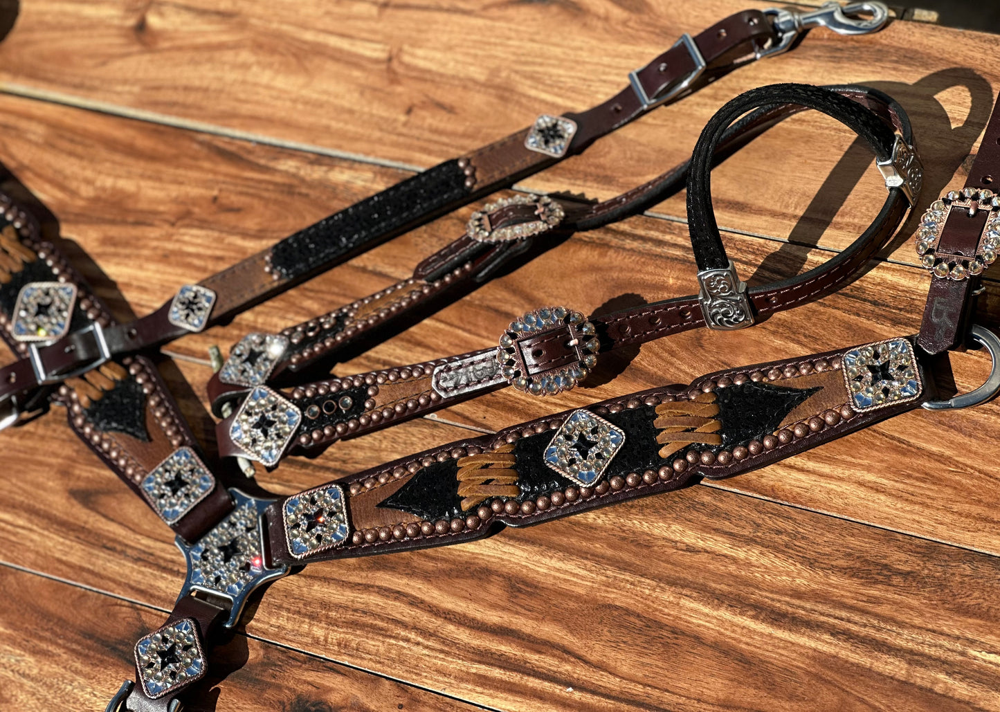Black cheetah over brown with cross stitch. With or without fringe.