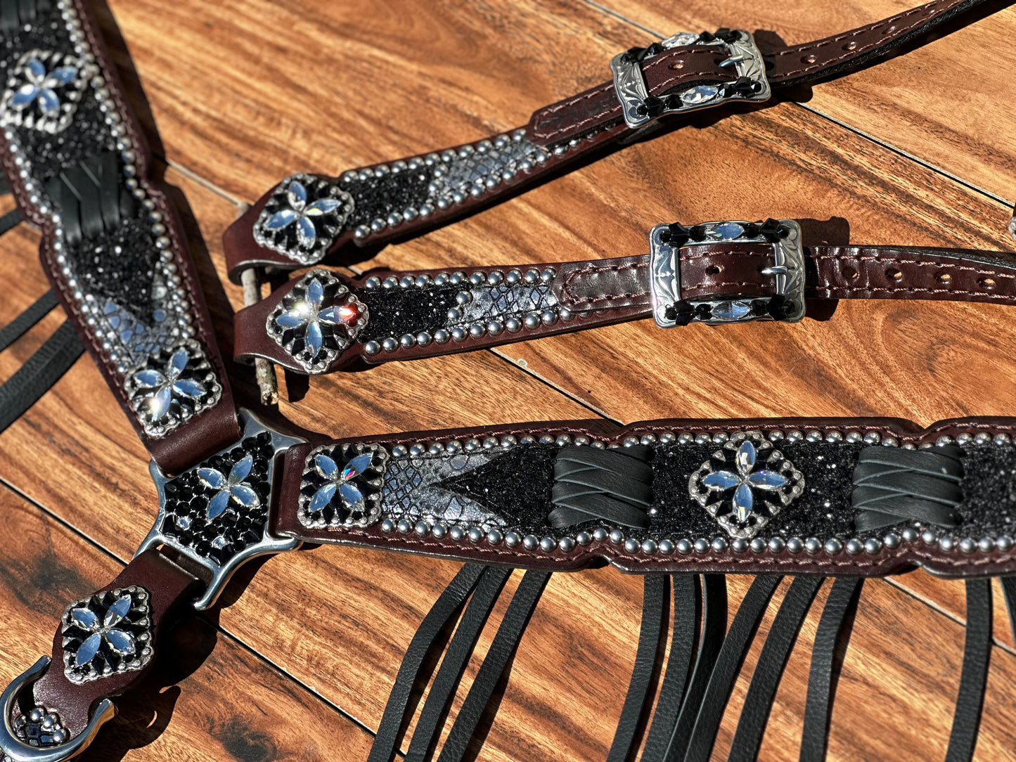 Silver Mystic with black chunky glitter. Cross stitch and fringe.