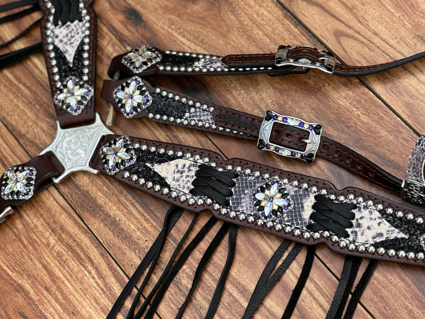 Python with black chunky glitter. Cross stitch and fringe.