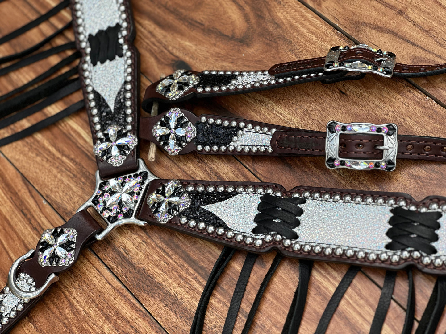 Ice over black chunky glitter. Cross stitch and fringe.