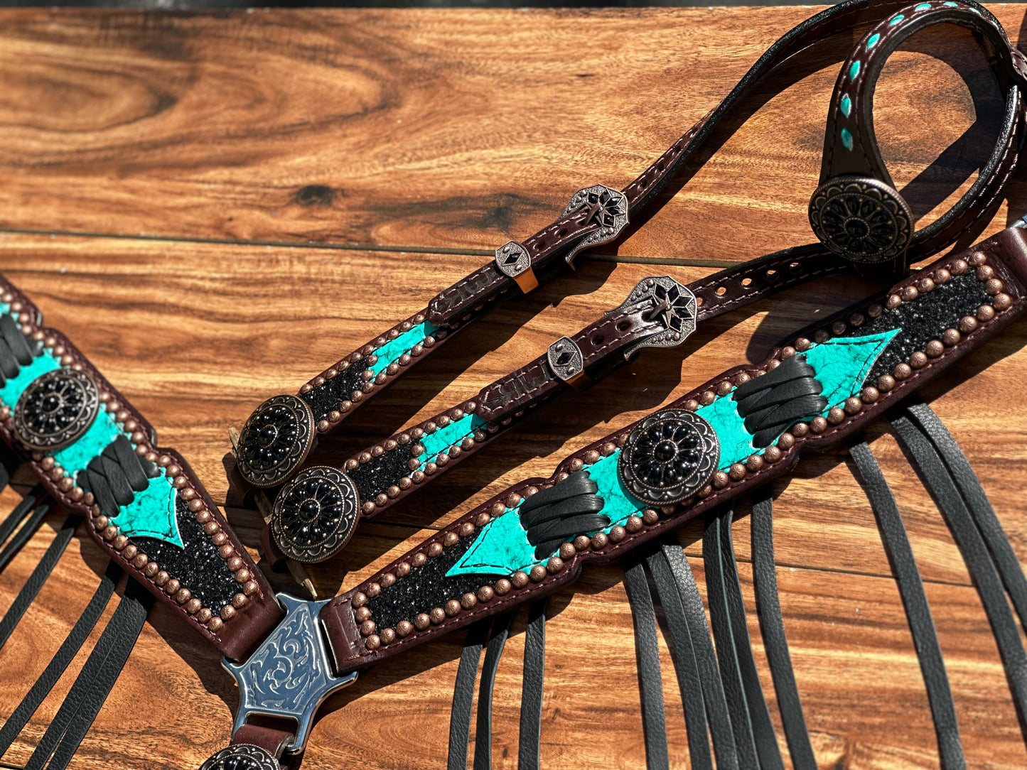 Turquoise with black chunky glitter and cross stitch