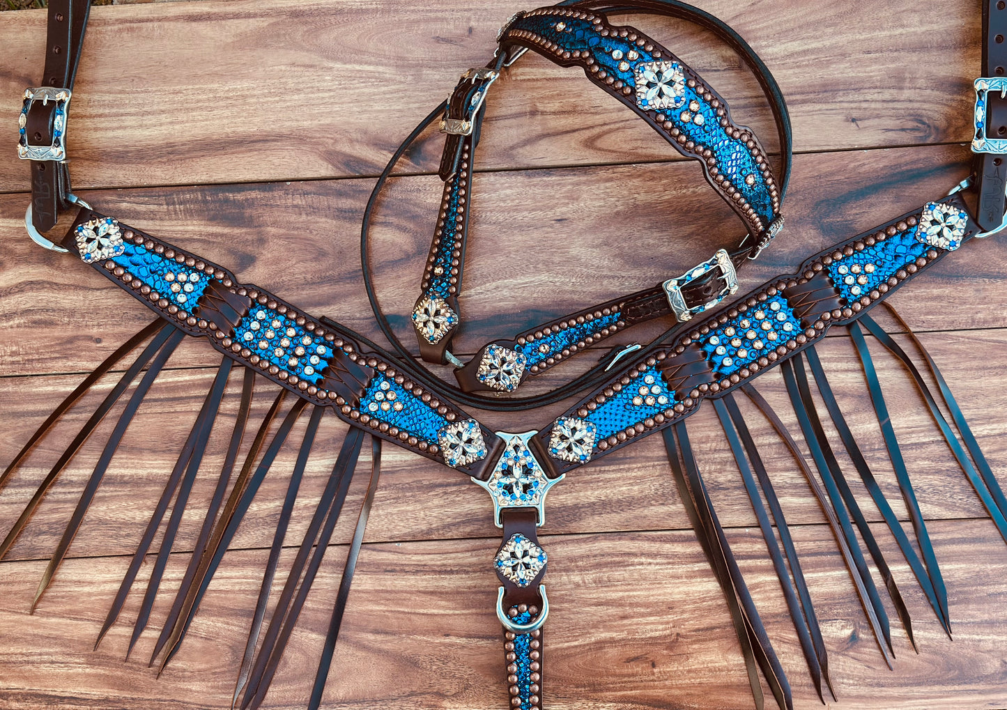 Blue mystic with crystals. Cross stitch and fringe.
