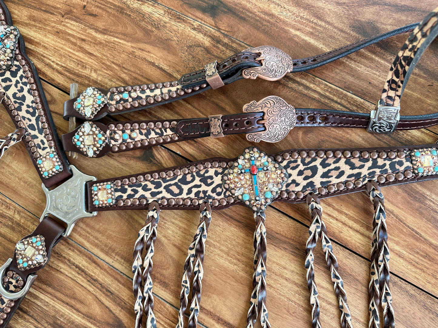 Tawny cheetah with fringe and cross conchos