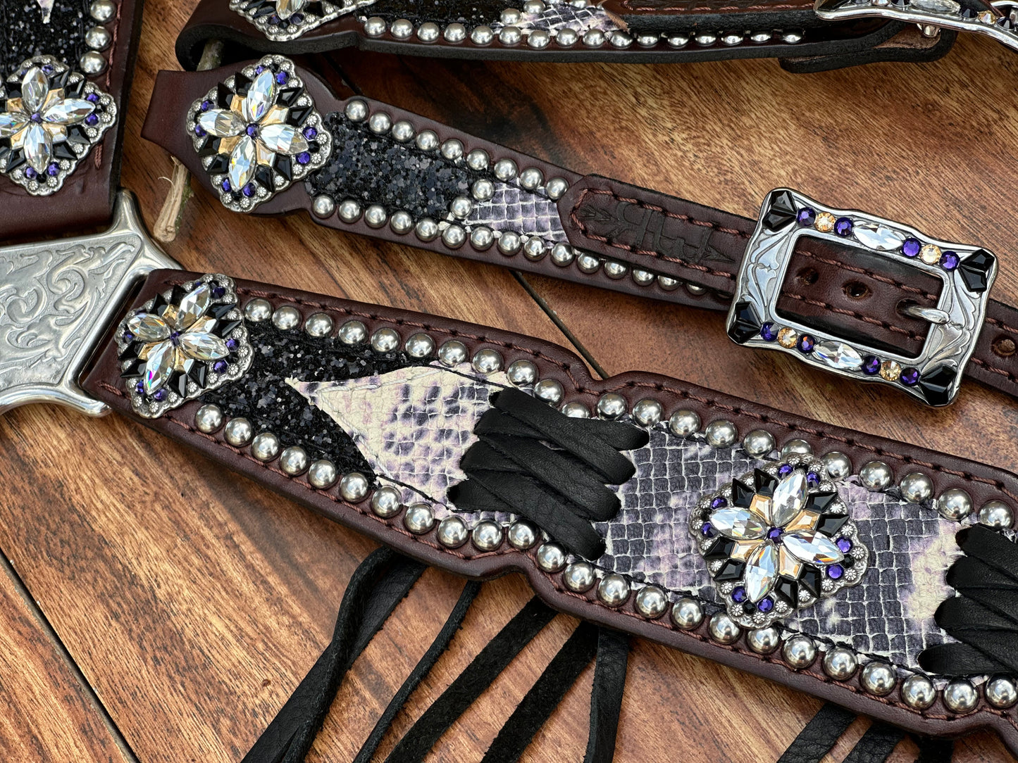 Python with black chunky glitter. Cross stitch and fringe.