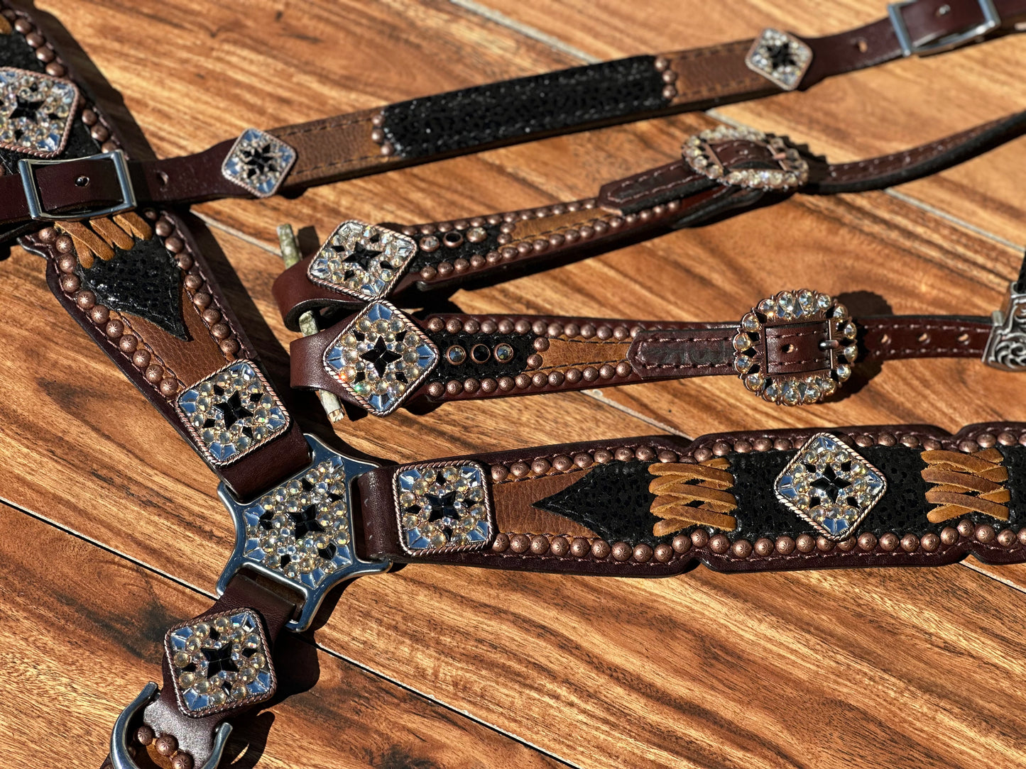 Black cheetah over brown with cross stitch. With or without fringe.