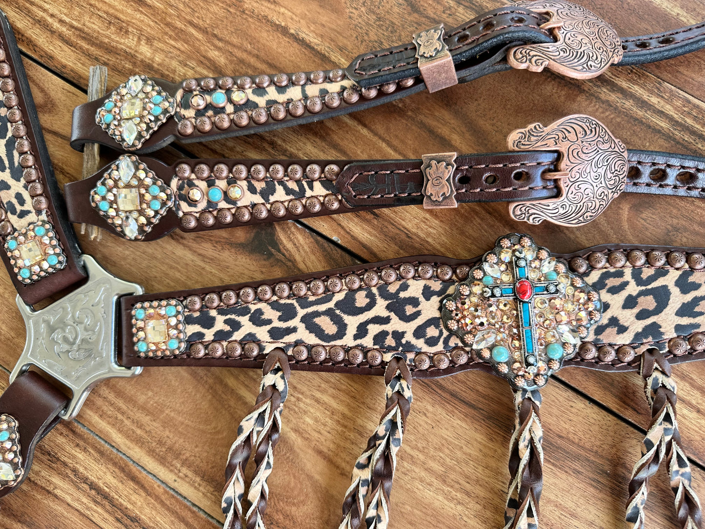 Tawny cheetah with fringe and cross conchos
