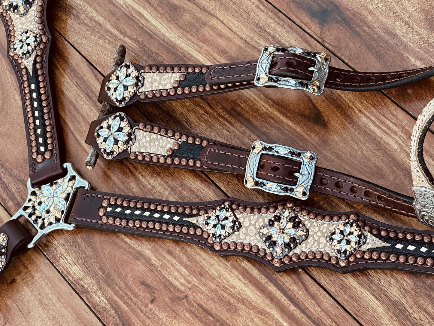 Rose gold cheetah with black elephant and buckstitch