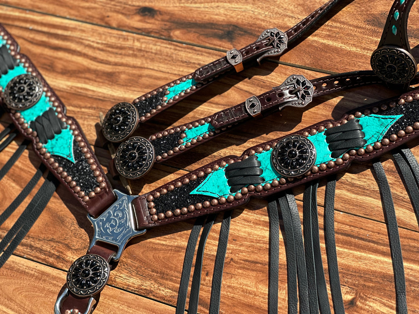 Turquoise with black chunky glitter and cross stitch