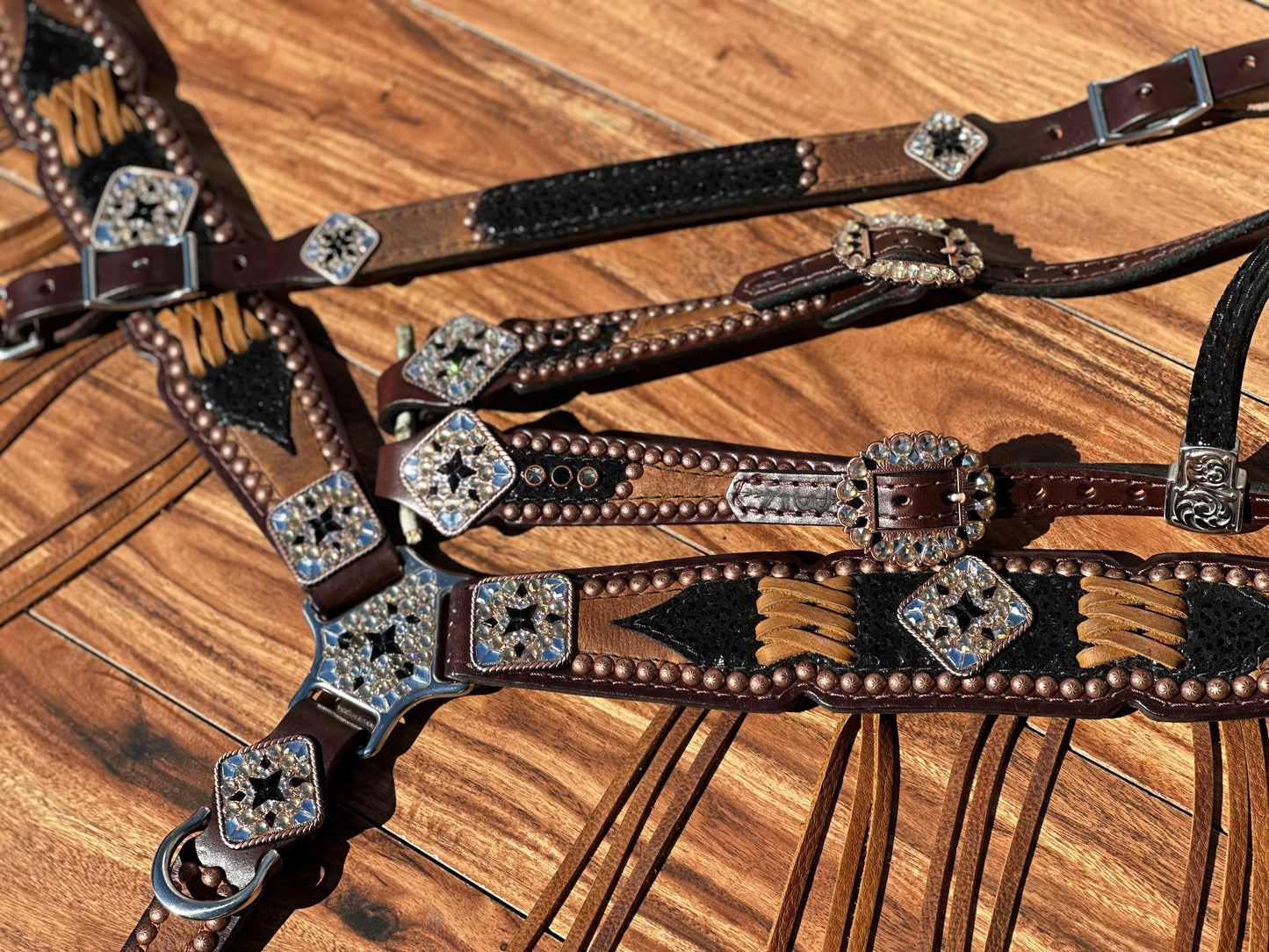 Black cheetah over brown with cross stitch. With or without fringe.